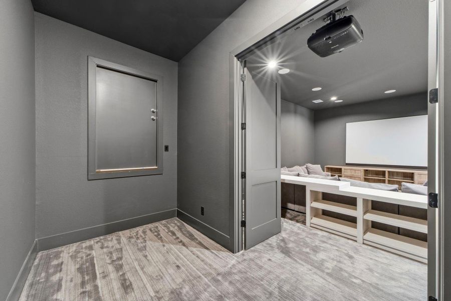 More A/C Storage in media room and tons of attic storage behind this door. More A/C Storage in media room and tons of attic storage behind this door.