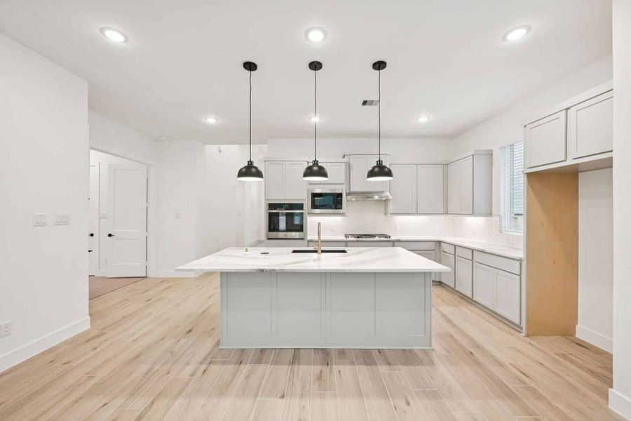 Representative furnished interior of a home built from the Lauren by Chesmar Homes in Nolina, Georgetown (Image 6).