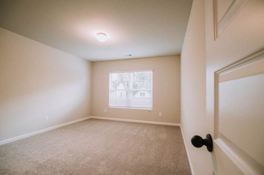 Representative unfurnished interior of a home built from the Reynolds by Piedmont Residential in Hampton Ridge, Jefferson (Image 22).