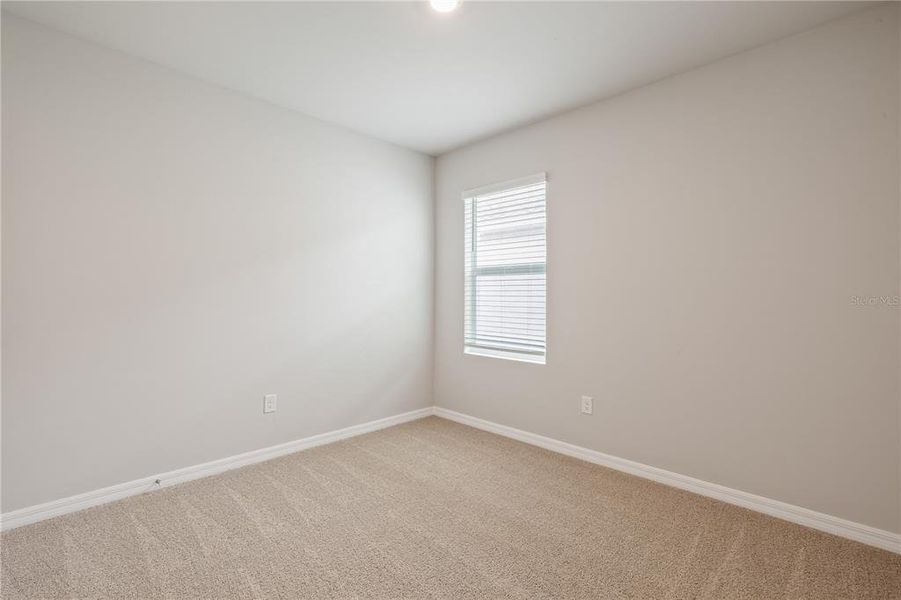 Spacious, unfurnished interior of a new home in Seagrass, Punta Gorda (Image 14).