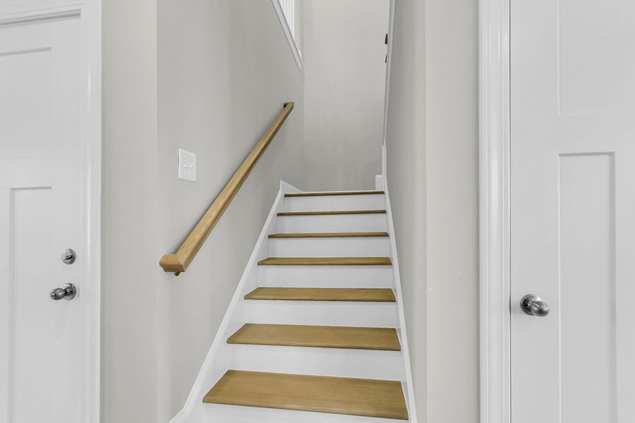 Spacious, unfurnished interior of a new home in Tidewater at Lakes of Cane Bay, Summerville (Image 44).