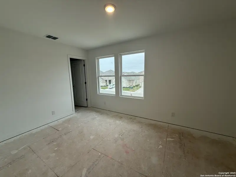 In-progress construction of a new home in Meadows at Hennersby Hollow 40's, San Antonio, TX (Image 27).