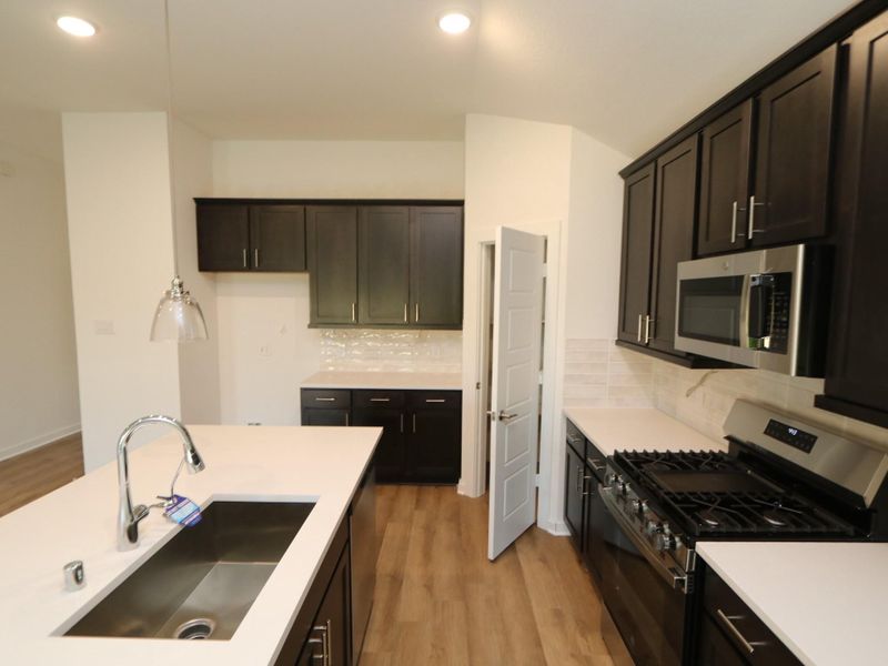 Furnished interior view inside a new home in Ambrose, La Marque (Image 4).