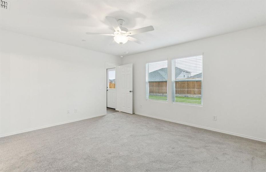 Spacious owner's suite with private bath