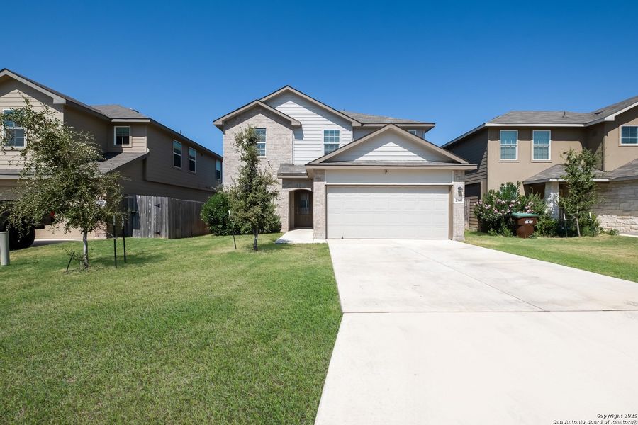 Front exterior of a new home in Laurel Vistas, San Antonio, TX, highlighting curb appeal (Image 2). Front exterior of a new home in Laurel Vistas, San Antonio, TX, highlighting curb appeal (Image 2).