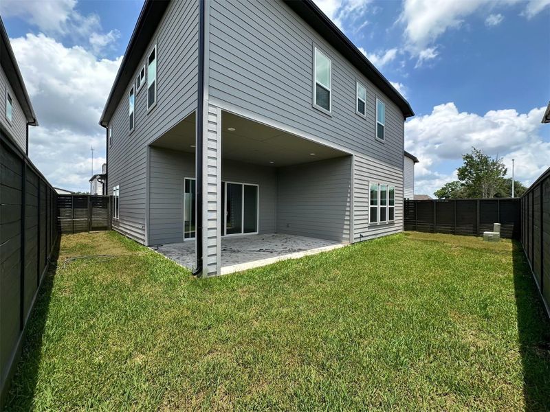 Exterior details and patio area of a home in , Missouri City (Image 25).