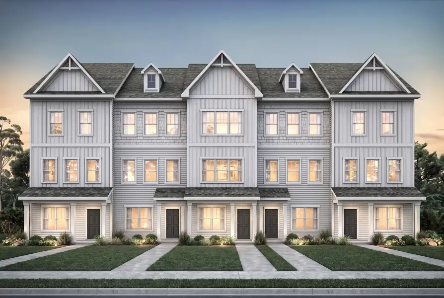Front exterior of a new home in Harris Place TH, Mooresville, NC, highlighting curb appeal (Image 1). Front exterior of a new home in Harris Place TH, Mooresville, NC, highlighting curb appeal (Image 1).
