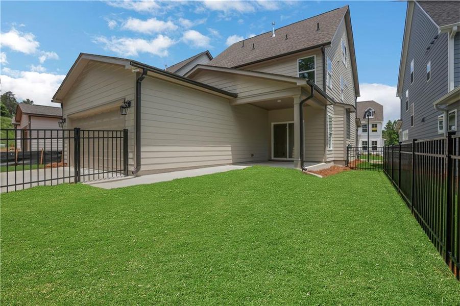 Exterior details and patio area of a home in Marble Tree, Ball Ground (Image 4).