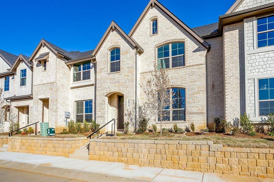 Front exterior of a new home in Knight's Landing on Eden Road, Arlington, TX, highlighting curb appeal (Image 21).