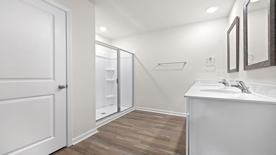 Furnished interior view inside a new home in Lakestone, Woodruff (Image 7).