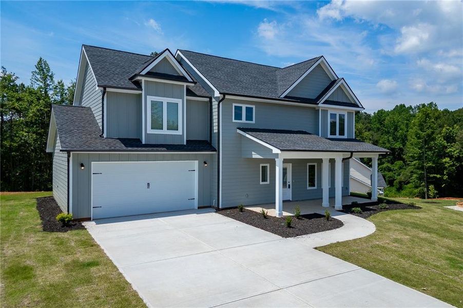 Front exterior of a new home in , Toccoa, GA, highlighting curb appeal (Image 28). Front exterior of a new home in , Toccoa, GA, highlighting curb appeal (Image 28).