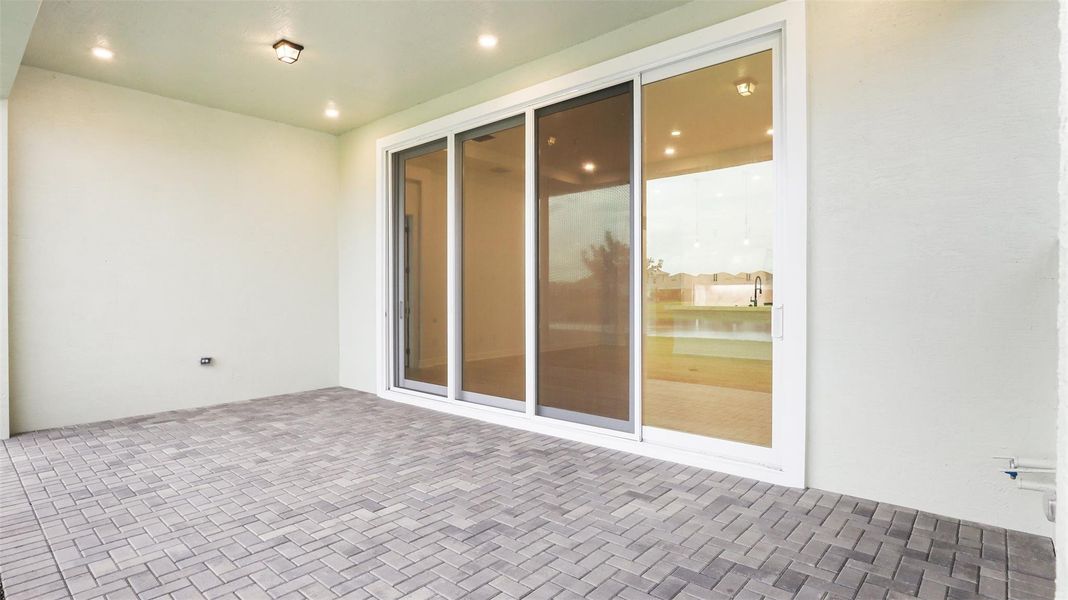 Exterior details and patio area of a home in Cresswind Palm Beach at Westlake, Westlake (Image 29).