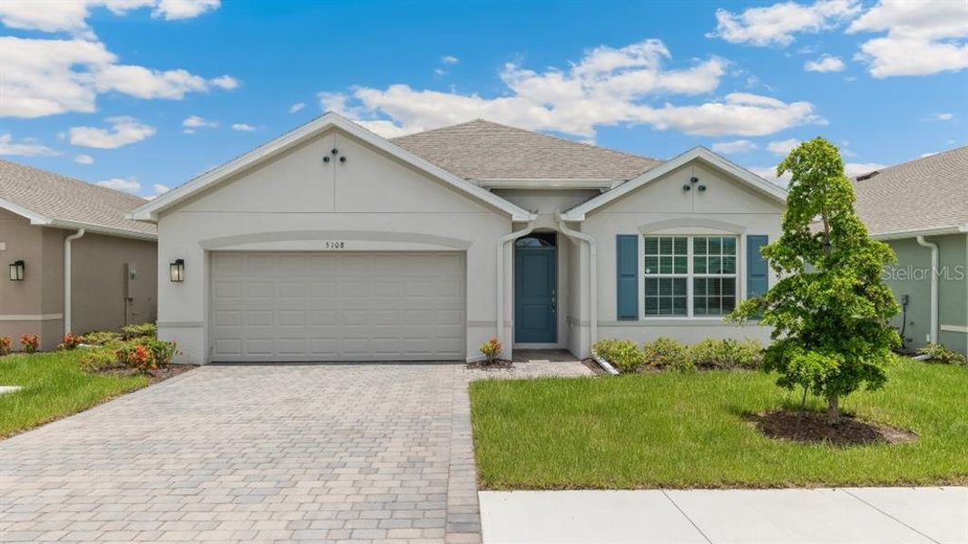 Front exterior of a new home in , Port Charlotte, FL, highlighting curb appeal (Image 1). Front exterior of a new home in , Port Charlotte, FL, highlighting curb appeal (Image 1).