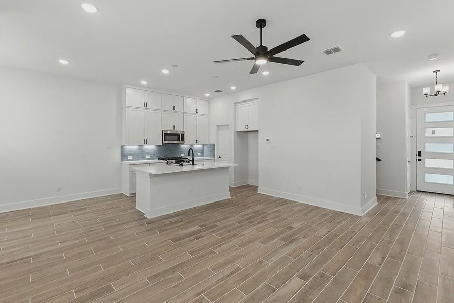 Representative unfurnished interior of a home built from the Balder by Chesmar Homes in Rose Hill, San Antonio (Image 8). Representative unfurnished interior of a home built from the Balder by Chesmar Homes in Rose Hill, San Antonio (Image 8).