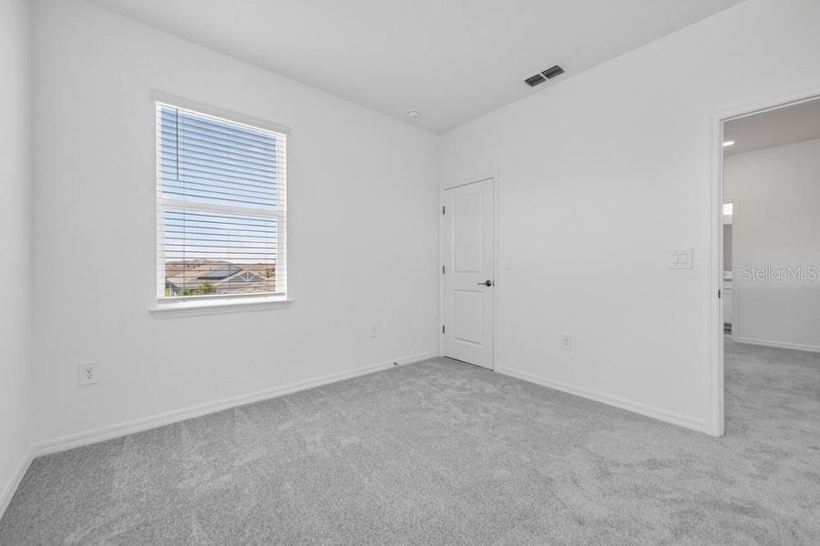 Spacious, unfurnished interior of a new home in Westview, Poinciana (Image 22).