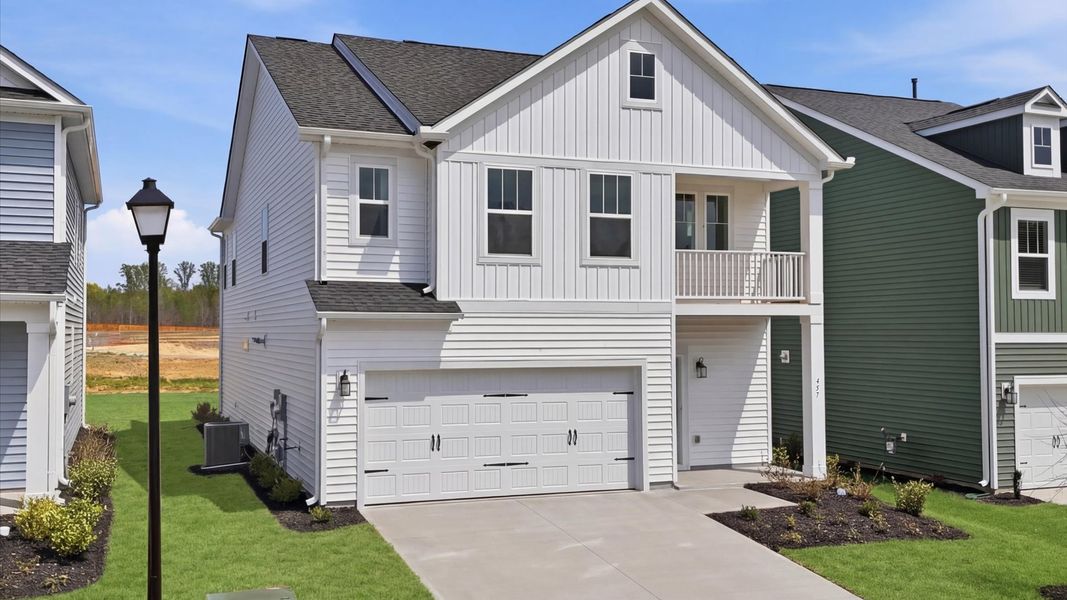 Front exterior of a new home in Harrier Point, Woodruff, SC, highlighting curb appeal (Image 20).