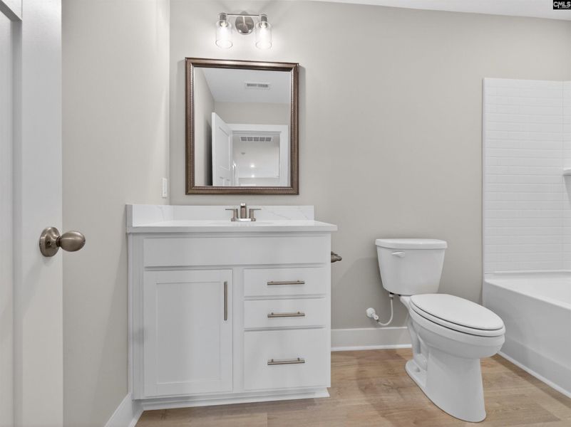Furnished interior view inside a new home in Collins Cove, Chapin (Image 19).