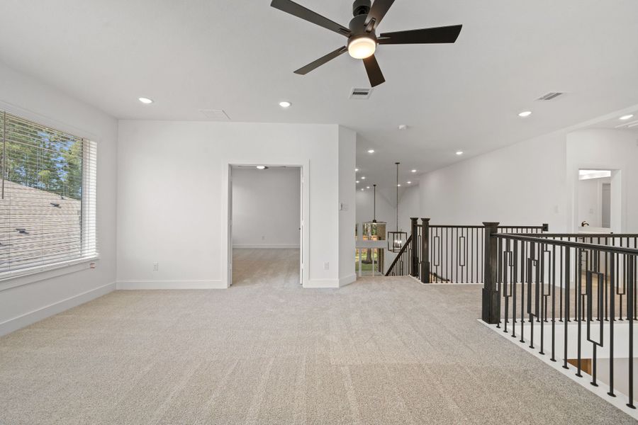 Representative unfurnished interior of a home built from the Waterloo – 60′ Lot by Chesmar Homes in Lakes of Cane Island, Katy (Image 21).