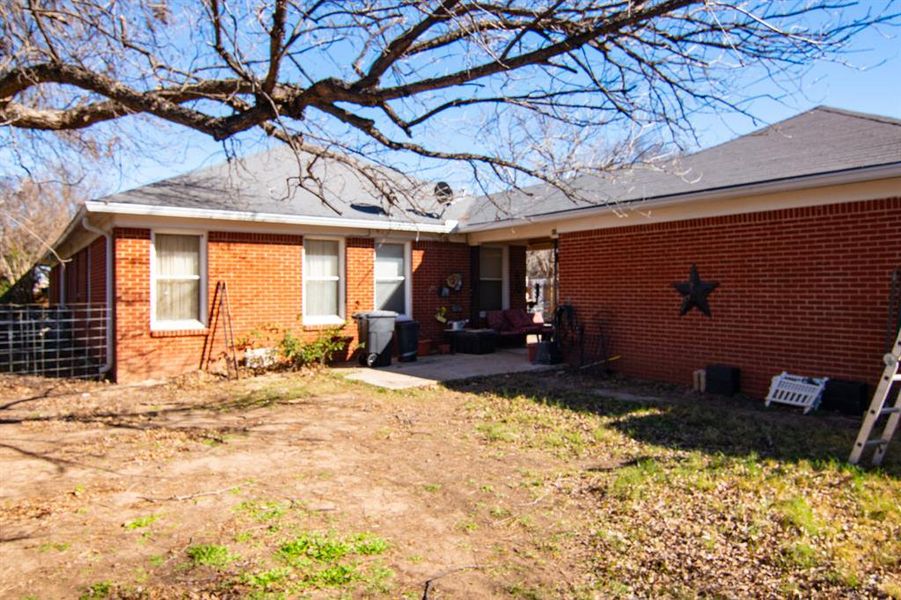 Exterior details and patio area of a home in , Brownwood (Image 19).