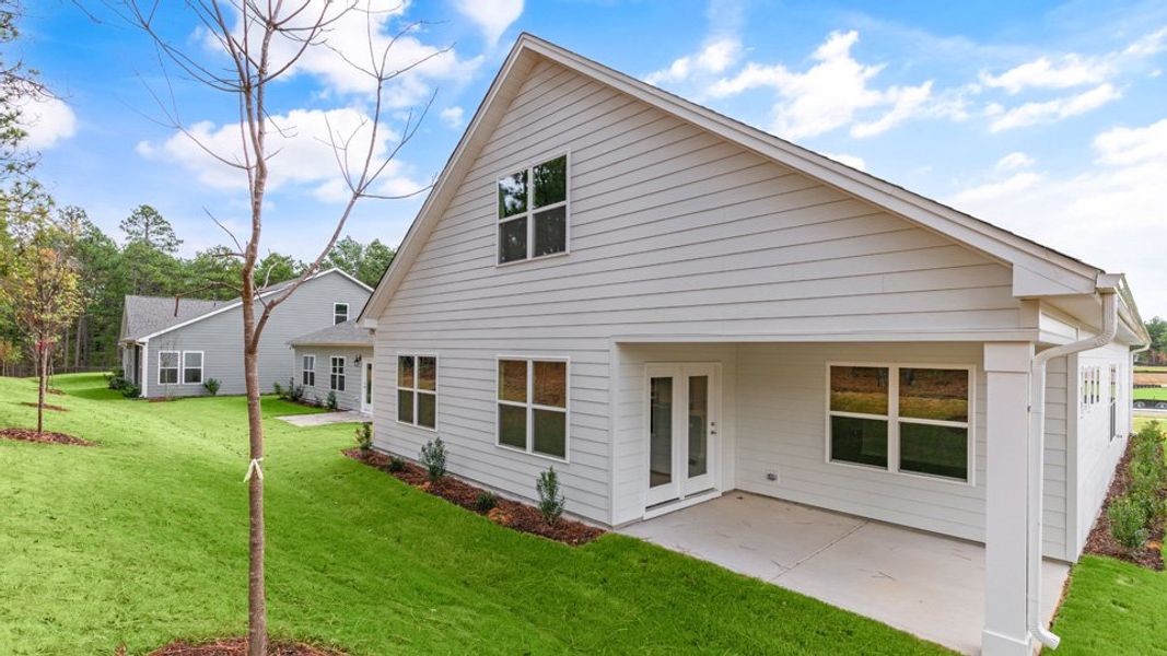 Exterior details and patio area of a home in The Villas at Martin Farms, Aberdeen (Image 21).