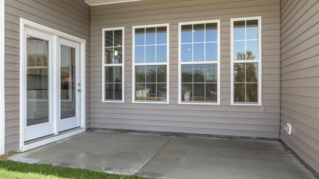 Exterior details and patio area of a home in The Villas at Martin Farms, Aberdeen (Image 4).