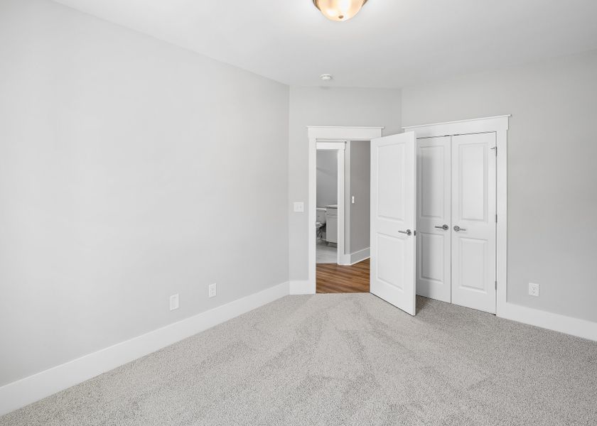 Representative unfurnished interior of a home built from the Birchwood by Bill Clark Homes in Osprey Landing, Southport (Image 26).