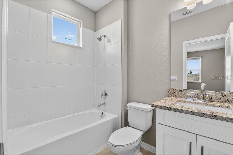 Furnished interior view inside a new home in Ardisia Park, New Smyrna Beach (Image 14).