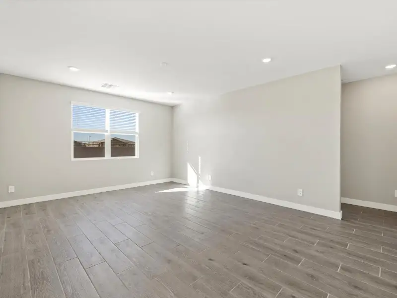 Spacious, unfurnished interior of a new home in White Tank Foothills Reserve Series, Waddell (Image 11). Spacious, unfurnished interior of a new home in White Tank Foothills Reserve Series, Waddell (Image 11).