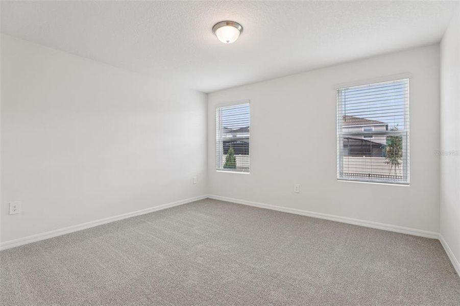 Spacious, unfurnished interior of a new home in Cagan Crossings West, Clermont (Image 32).