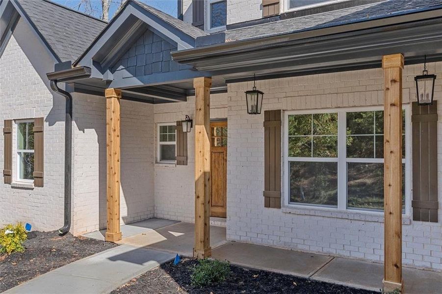 Front exterior of a new home in , Atlanta, GA, highlighting curb appeal (Image 24).