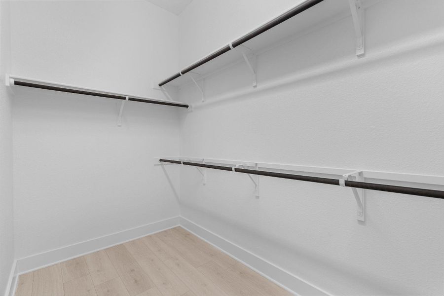 Walk-in closet in Primary Bedroom