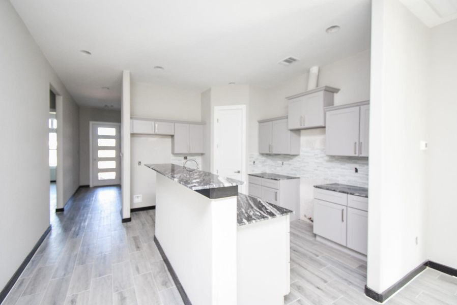Furnished interior view inside a new home in , Sweeny (Image 18).