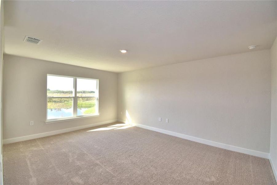 Spacious, unfurnished interior of a new home in Cadence Crossing, Auburndale (Image 37).
