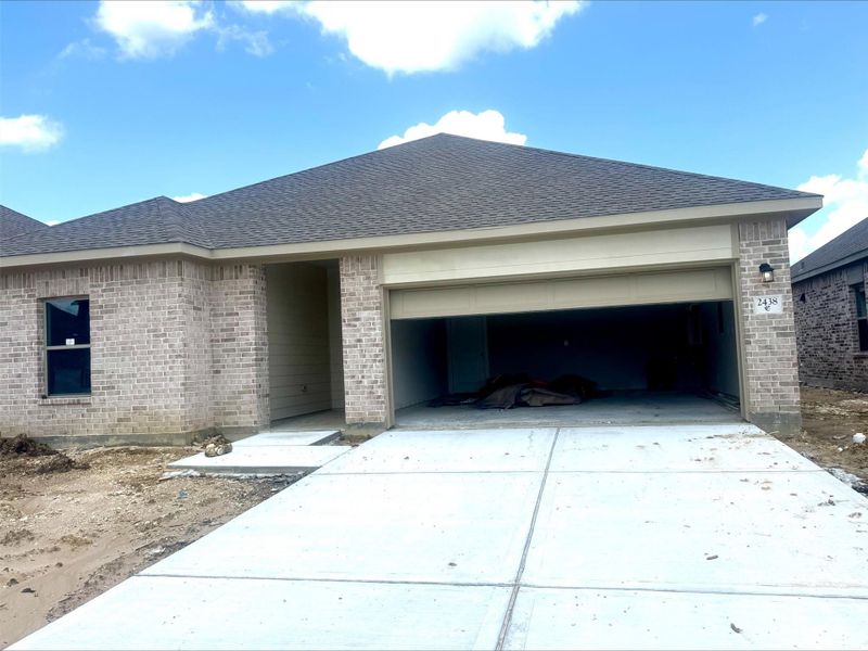 Front exterior of a new home in River Ranch Trails, Dayton, TX, highlighting curb appeal (Image 2). Front exterior of a new home in River Ranch Trails, Dayton, TX, highlighting curb appeal (Image 2).