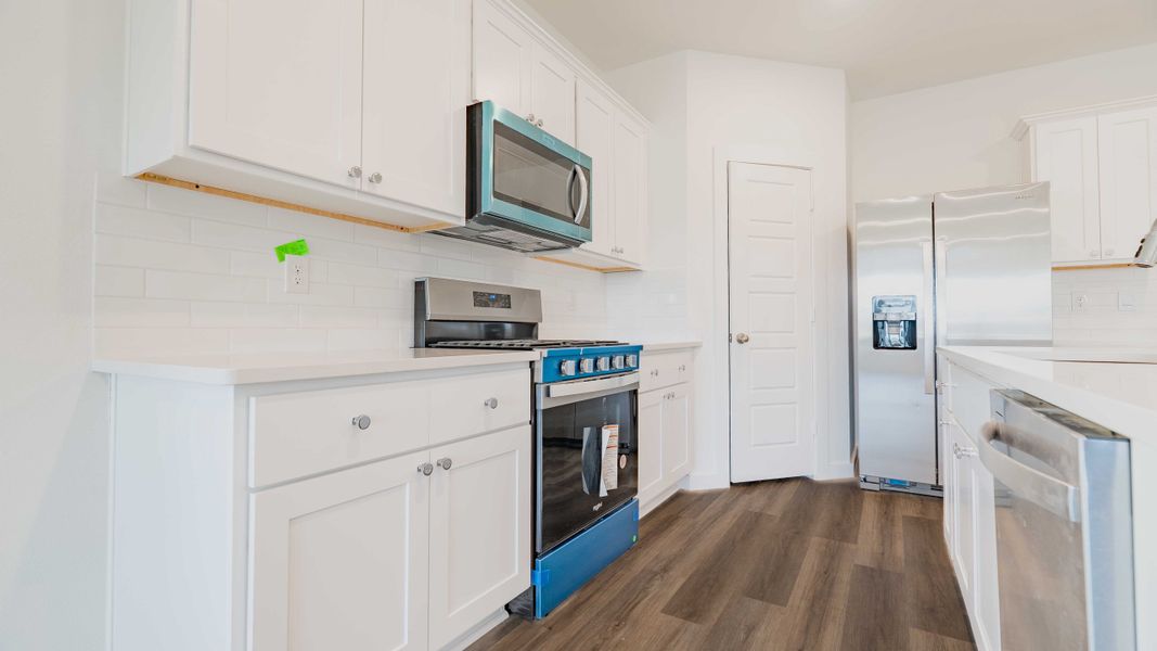Representative furnished interior of a home built from the The Kendall by D.R. Horton in Overlook West, Wolfforth (Image 3).