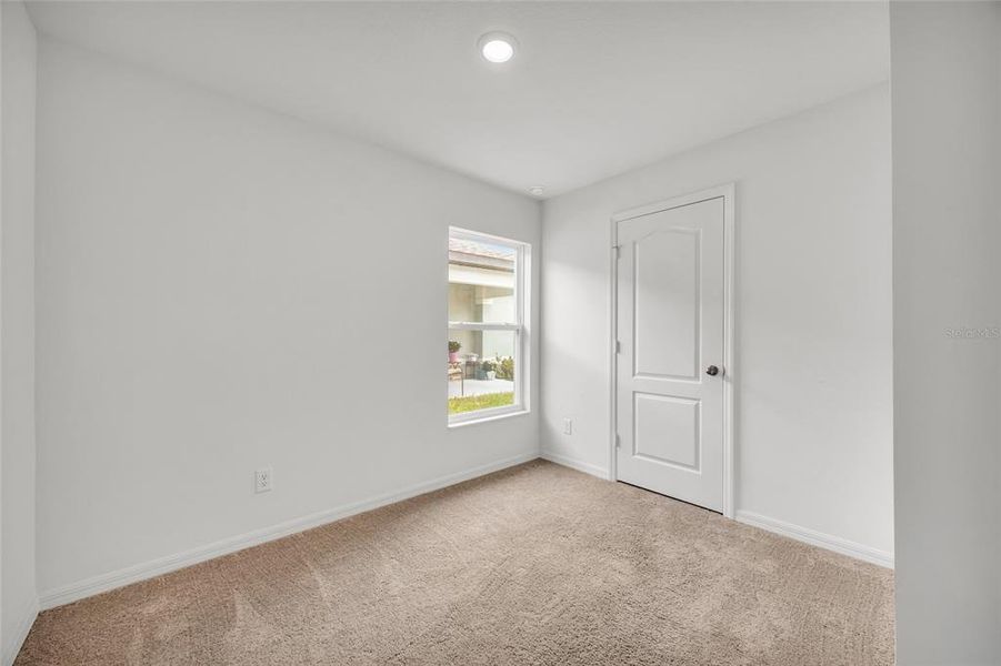 Spacious, unfurnished interior of a new home in Gum Lake Preserve, Lake Alfred (Image 18).