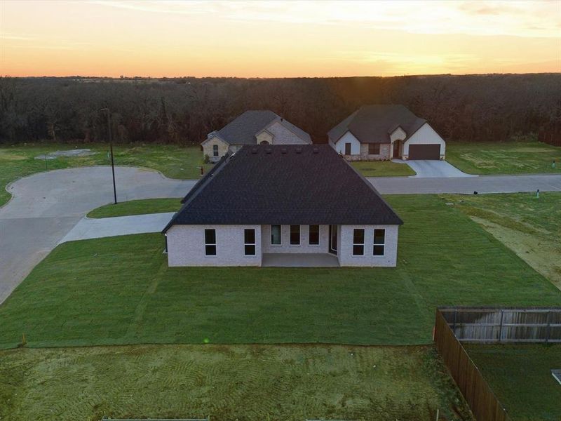 Front exterior of a new home in , Tolar, TX, highlighting curb appeal (Image 22).