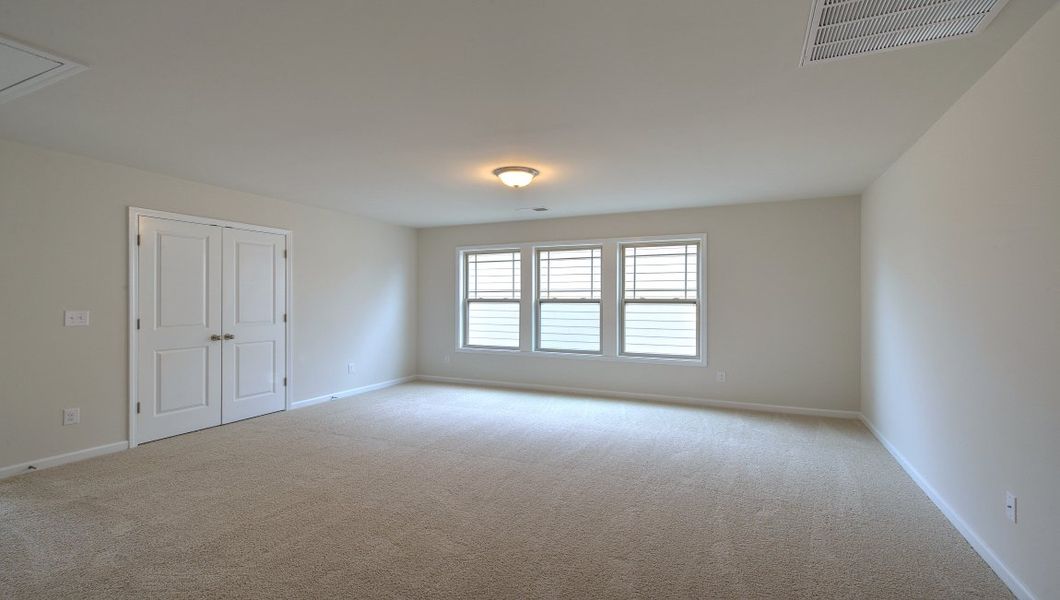 Spacious, unfurnished interior of a new home in Reserve at Tap Root Farms, Fletcher (Image 40).