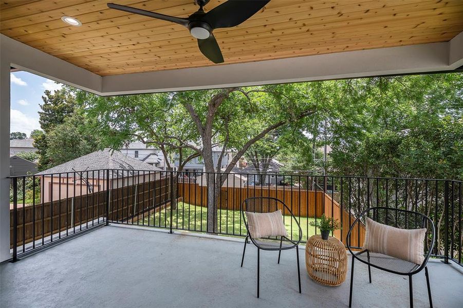 Balcony featuring ceiling fan connected to game room on second floor, great for entertainment.