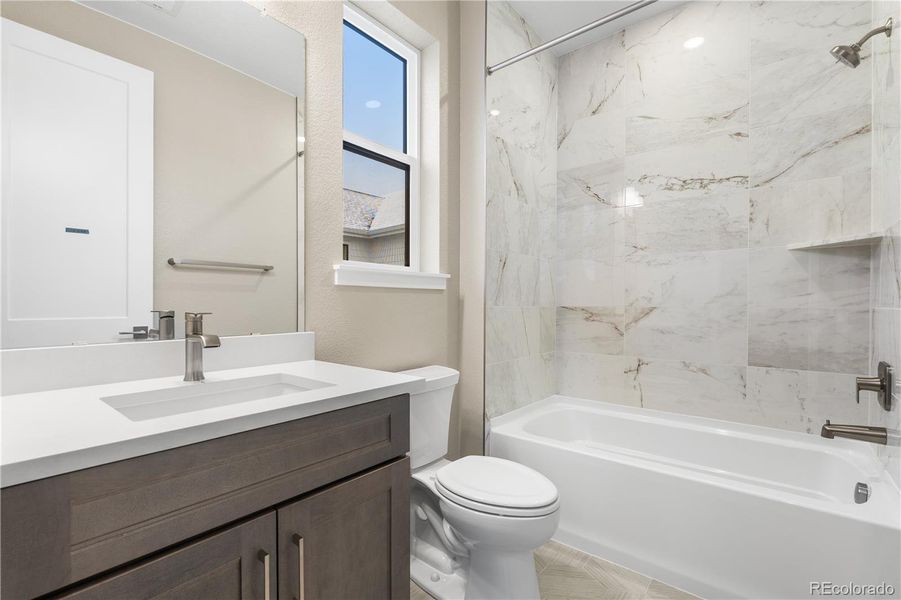 Furnished interior view inside a new home in Autograph at Lyric, Lone Tree (Image 36).