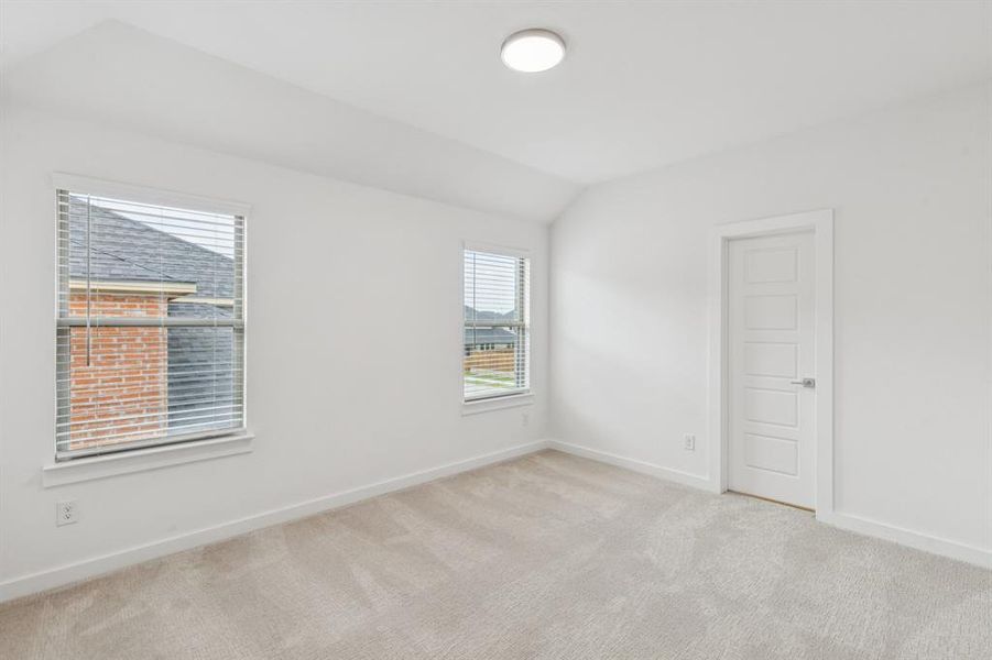 Bedroom in the Da Vinci II home plan by Trophy Signature Homes – REPRESENTATIVE PHOTO