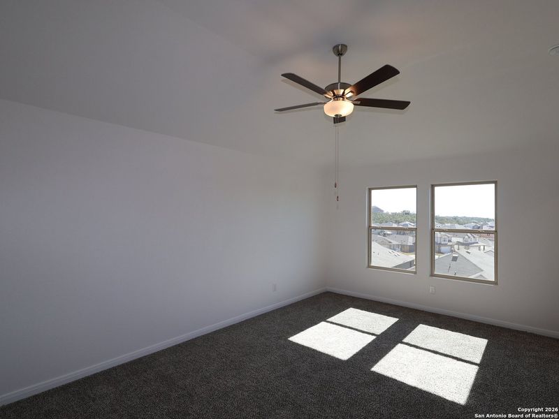 Spacious, unfurnished interior of a new home in Hunters Ranch, San Antonio (Image 16).