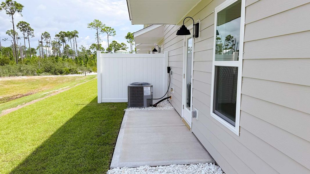 Exterior details and patio area of a home in WindMark Beach, Port Saint Joe (Image 25).
