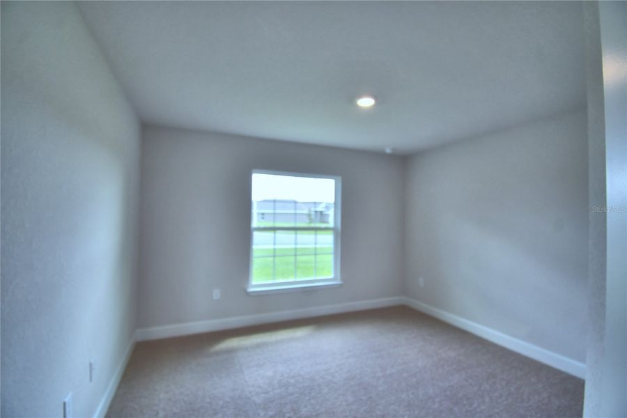 Spacious, unfurnished interior of a new home in Cadence Crossing, Auburndale (Image 21).