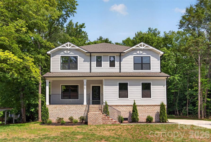 Front exterior of a new home in , Harrisburg, NC, highlighting curb appeal (Image 26).