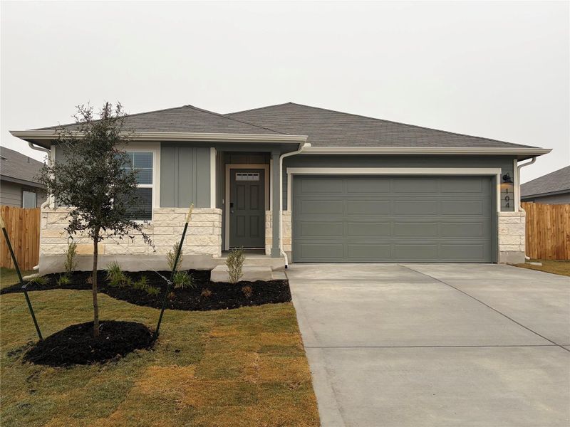View of front of property featuring concrete driveway, roof with shingles, an attached garage, and board and batten siding View of front of property featuring concrete driveway, roof with shingles, an attached garage, and board and batten siding