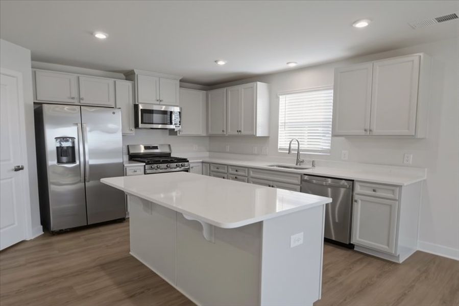 Furnished interior view inside a new home in Reidville Town Center Cottages, Duncan (Image 6).
