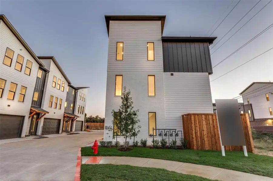 Front exterior of a new home in , Farmers Branch, TX, highlighting curb appeal (Image 2). Front exterior of a new home in , Farmers Branch, TX, highlighting curb appeal (Image 2).