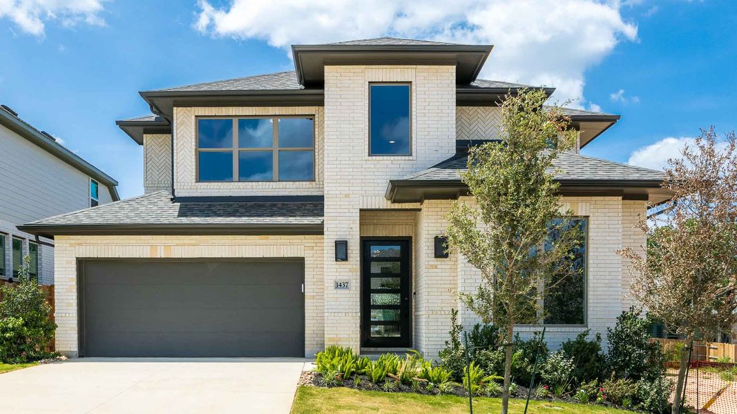 Front exterior of a new home in Parkside on the River West, Georgetown, TX, highlighting curb appeal (Image 1). Front exterior of a new home in Parkside on the River West, Georgetown, TX, highlighting curb appeal (Image 1).