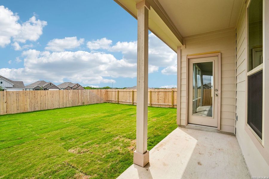 Exterior details and patio area of a home in Prairie Green, Converse (Image 20).